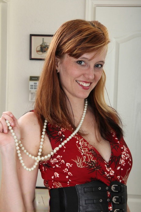 Busty amateur MILF Alex S strips and touches her fuzzy pussy on the carpet