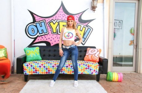 Blonde chick Goldie Glock uncovers her flat chest before showcasing her pussy