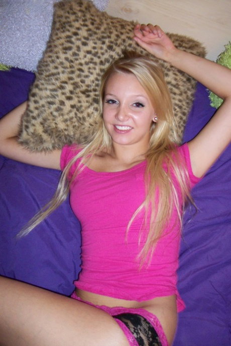 Beautiful teen Elle 3 removes her sexy panties and shows her yummy clit
