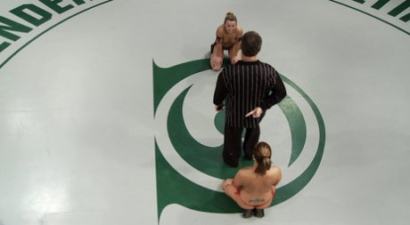 Hot girls have lesbian sex during a wrestling match before a referee