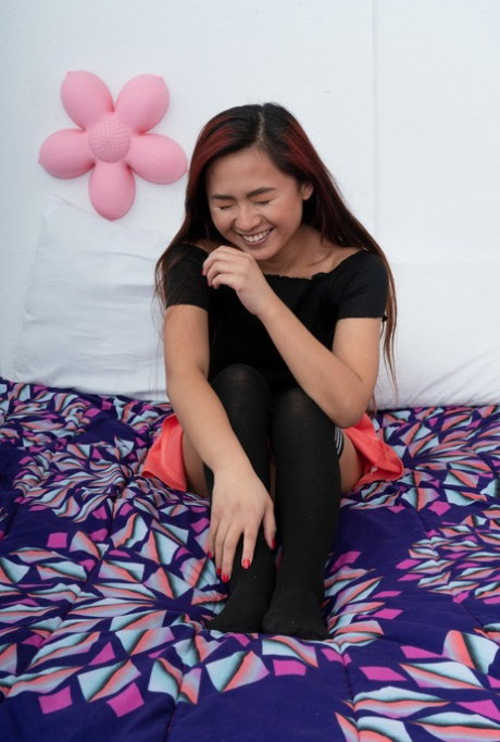 Exotic Asian teen Elle Voneva strips & flaunts her hot feet, big ass & holes