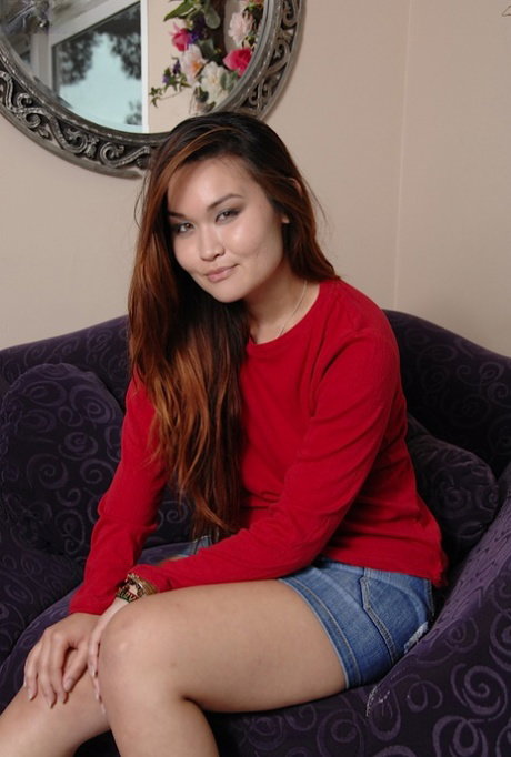 Asian college girl Saber Takestita masturbates her shaved twat after disrobing