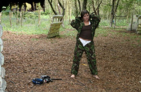 Kinky mature army woman Bhala Sada peels off her uniform outdoors