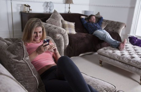 Hot Romanian babe Eva Johnson blowing her inked lover on the sofa