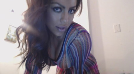 MILF Briana Lee flaunts her big booty and amazing big tits in a sheer dress