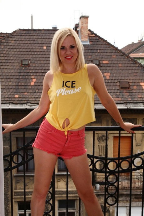 Blonde amateur Yasmine Gold gets naked before plunging fingers into her cunt