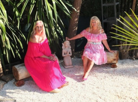 Older blonde pumpers Melody and Randy Raz flashed their panties while outdoors