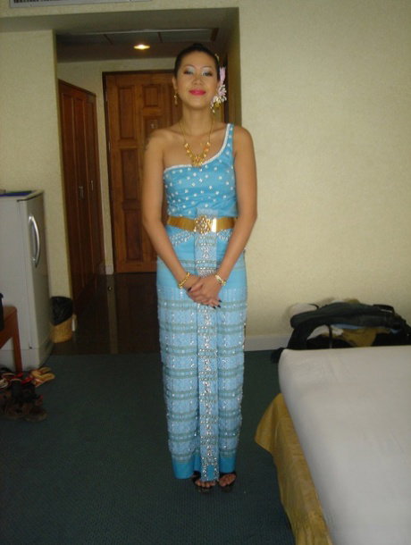 Petite Thai girl On bares her tiny tits while undressing for pussy play