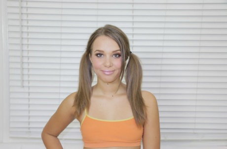 Cute brunette teen Liza Rowe in pigtails & braces gives arousing POV blowjob