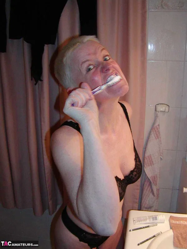 Older blonde woman Tiffany Pearl gets dressed after taking a bath  - Mature, Short Hair, Bath, Saggy Tits, Lingerie, Natural Tits, Leather, Big Tits, Tattoo, Panties  - Photo 13