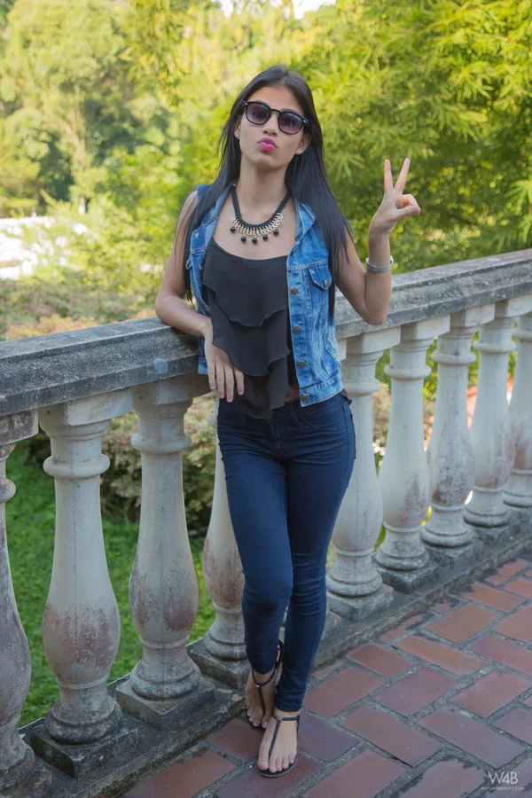 Venezuelan teen with a hot ass Denisse Gomez strips and poses on the terrace  - Venezuela, Babe, Teen, Latina, Panties, Ass, Skirt, Outdoor, Clothed, Jeans  - Photo 1