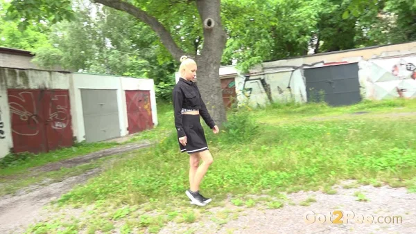 Blonde girl Nykla hitches up her dress before taking a piss by a garage  - Pissing, Pussy, Close Up, Panties, Shaved, Spreading, Outdoor, Skirt, Beautiful, Solo  - Photo 2