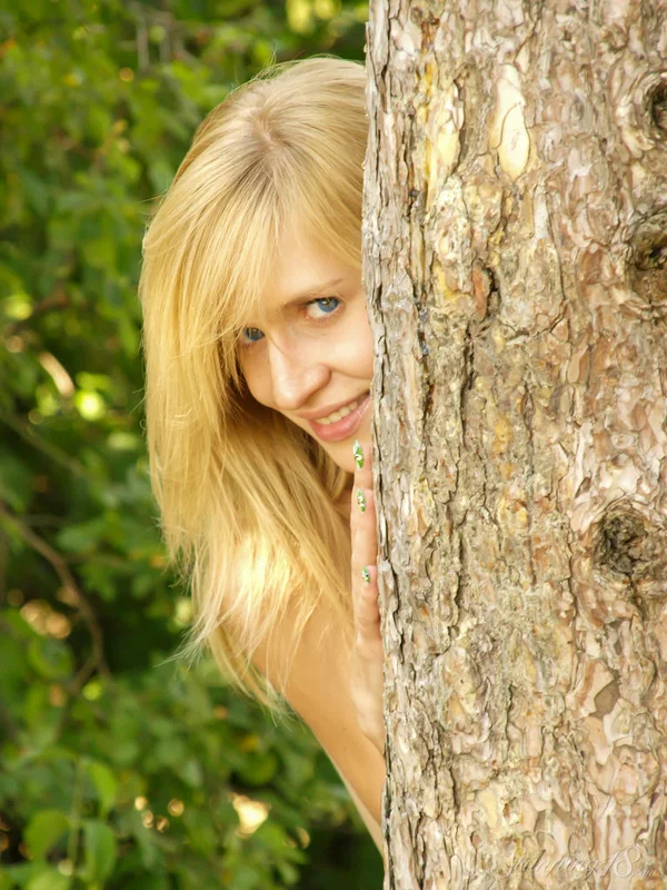 Charming blonde teen Briseida N gets bare naked up against a softwood tree  - Outdoor, Teen, Clothed, Tiny Tits, Shaved, Beautiful, Model, Glamour, Babe, Legs  - Photo 16