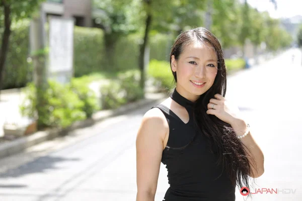 Japanese beauty Aya Shiina models on a city street in a black dress  - Japanese, Asian, Public, Brunette, Outdoor, Ass, Non Nude, PAWG, Babe, Beautiful  - Photo 1