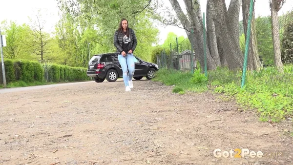 Solo girl Naomi Bennet takes a pee on a gravel roadway when caught short  - Pissing, Caught, Public, Jeans, Pussy, Spreading, Close Up, Outdoor, Czech, Beautiful  - Photo 2