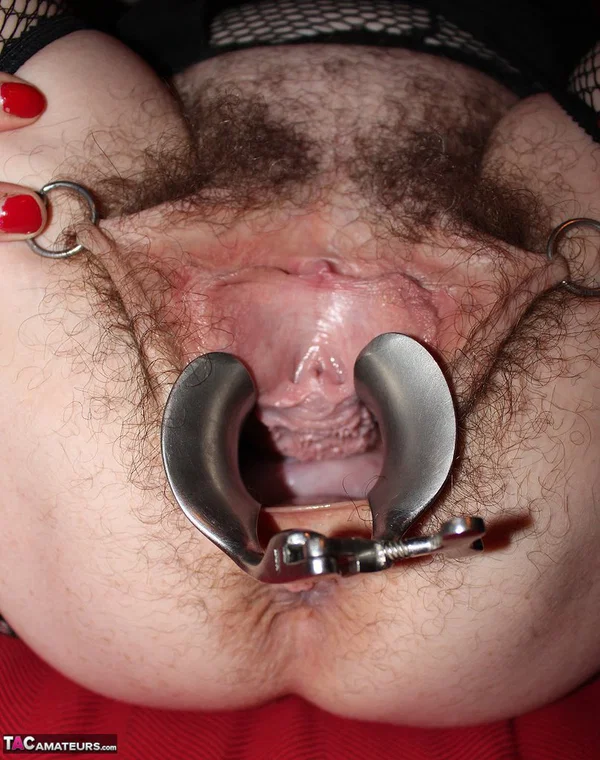 Older woman Mary Bitch uses a steel device to spread her hairy cunt  - Mature, Piercing, Hairy, Pantyhose, Amateur, Pussy, Close Up, Clothed, Glasses, Dildo  - Photo 18
