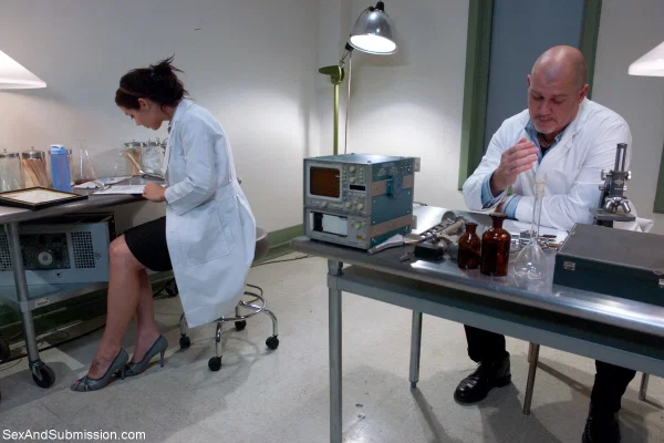 Bald doctor examines naked body of good-looking assistant in people's presence  - Brunette, Non Nude  - Photo 7