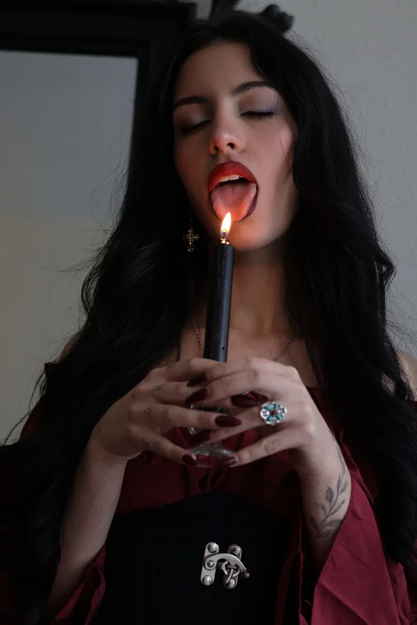 Goth girl Kore Fox blows out a candle before lighting one on her tongue  - Goth, Spanish, Fetish, Skirt, Close Up, Nipples, Pornstar, Skinny, Babe, Beautiful  - Photo 4