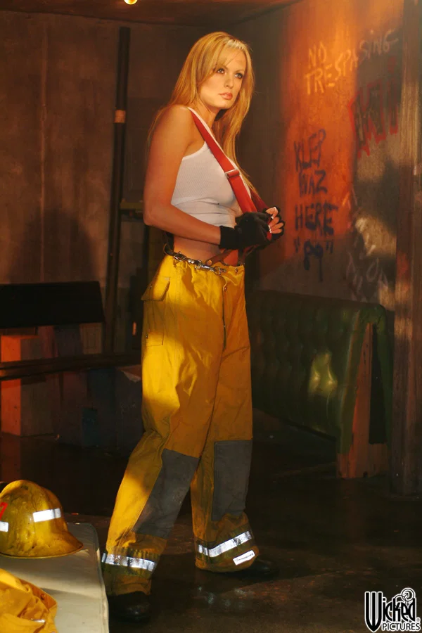 Sexy blonde cougar Stormy Daniels doffs her firefighter uniform and poses  - MILF, Mature, Perfect, Big Tits, Lesbian, Tall, White, Fake Tits, Blonde, Pornstar  - Photo 2