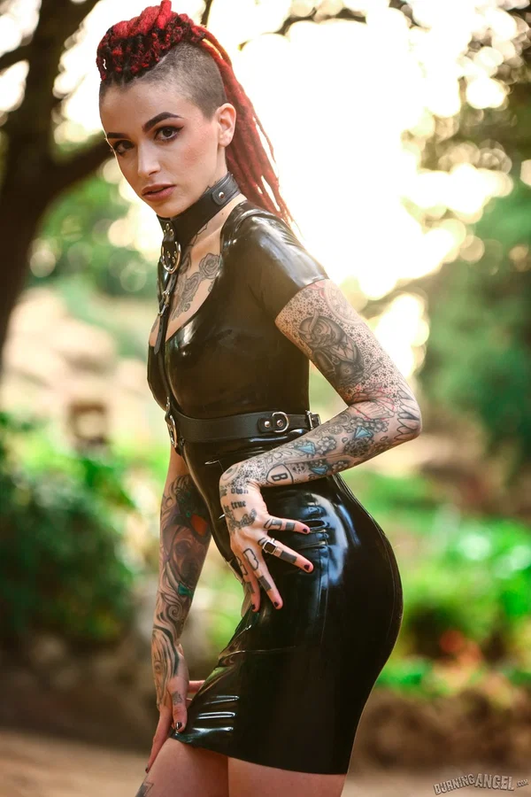 Goth girl Leigh Raven works clear of latex dress for nude solo poses  - Goth, Tattoo, Fetish, Latex, Piercing, Leather, Nipples, Tiny Tits, Redhead, Natural Tits  - Photo 4