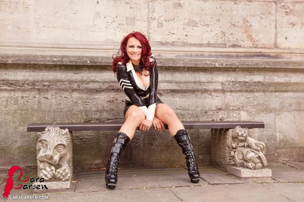 Redhead amateur Lara Larsen models latex clothing and boots on cobblestone  - Public, Fetish, Non Nude, Latex, Redhead, Amateur, Clothed, Boots, Skirt, High Heels  - Photo 8