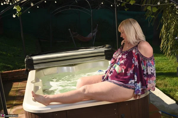 Fat older blonde Melody peels off black leggings afore an outdoor hot tub  - Mature, BBW, Curvy, Thick, Yoga Pants, Pool, Chubby, Amateur, Outdoor, Non Nude  - Photo 16