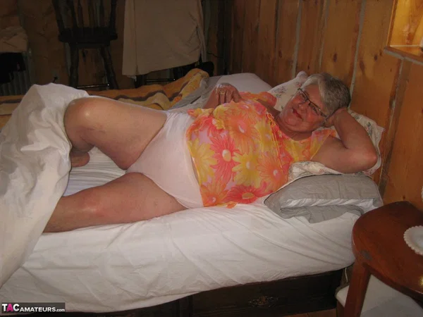 Obese granny Girdle Goddess wakes up from a nap and precedes to strip naked  - Granny, SSBBW, BBW, Amateur, Skirt, Chubby, European, Thick, Curvy, Glasses  - Photo 2