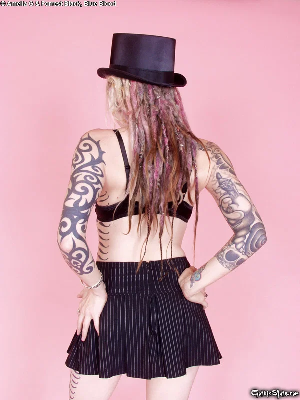 Tattooed blonde Voltaire Blue doffs a top hat while getting naked in heels  - Tattoo, Fetish, Upskirt, Skirt, High Heels, Ass, PAWG, Panties, Tiny Tits, Babe  - Photo 6