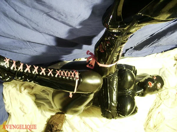 Solo girl Darkwing Zero sports red lips while posing in head to toe latex wear  - Latex, Fetish, Boots, High Heels, Close Up, Spreading  - Photo 4