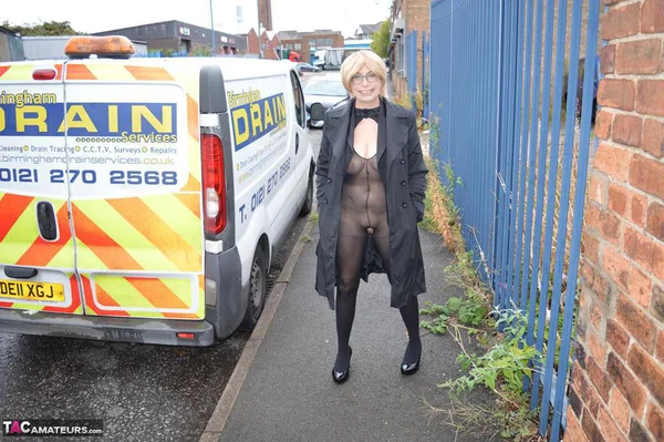 Mature woman flashes her tits and twat on sidewalk and in sex shop  - Mature, British, Amateur, Pantyhose, Glasses, Public, Spreading, Big Tits, Outdoor, Natural Tits  - Photo 1