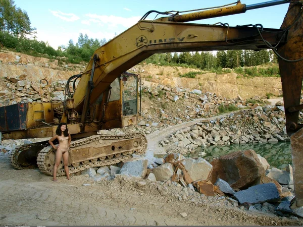 Naked Asian girl poses on a bulldozer at a quarry during the day  - Asian, Amateur, Outdoor, Tiny Tits, Brunette, Non Nude, Hairy, Ass, Model, Glamour  - Photo 12