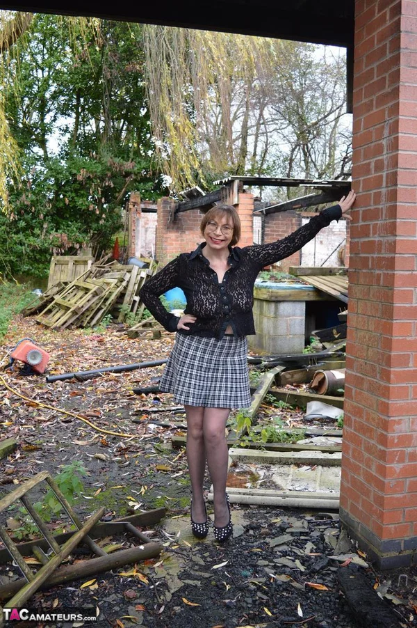 Amateur chick Barby Slut strips to her heels on a demolition site  - BBW, Mature, Glasses, Outdoor, Pantyhose, Chubby, High Heels, Short Hair, Skirt, Curvy  - Photo 3