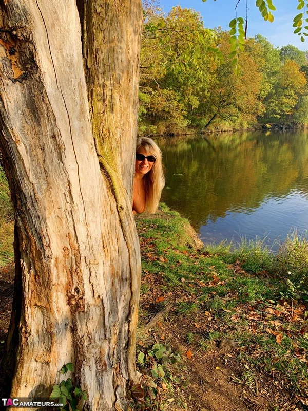 Blonde amateur Sweet Susi models naked in black leather boots near a lake  - Mature, Boots, MILF, PAWG, Ass, Leather, Outdoor, Big Tits, Glasses, Amateur  - Photo 1