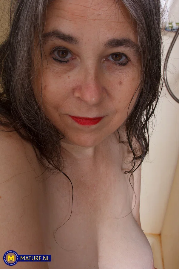 Horny granny Olivia Olay toys her hairy pussy with a dildo on her bed  - Granny, Mature, Amateur, British, European  - Photo 9