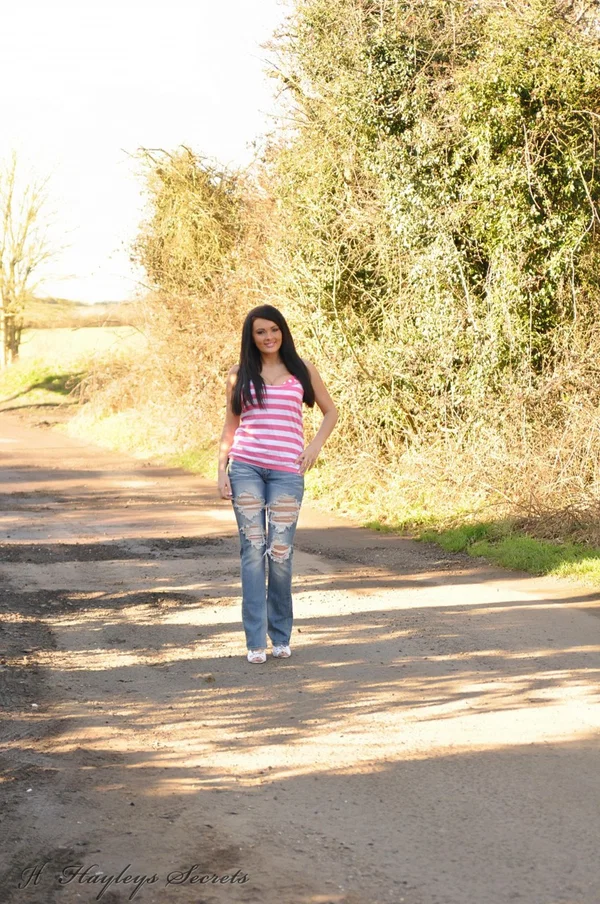Hot brunette chick takes a walk in ripped jeans before baring her big tits  - Babe, Brunette, Pornstar, Big Tits, Face, Jeans, Lingerie, Outdoor, Fake Tits, Clothed  - Photo 1