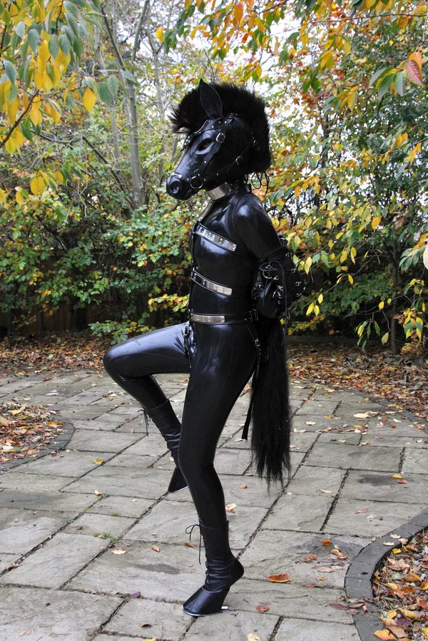 Kinky slut posing outdoors in a horse mask and a full-coverage latex outfit  - Latex, Fetish, BDSM, Bondage, Schoolgirl, Outdoor, Non Nude  - Photo 10