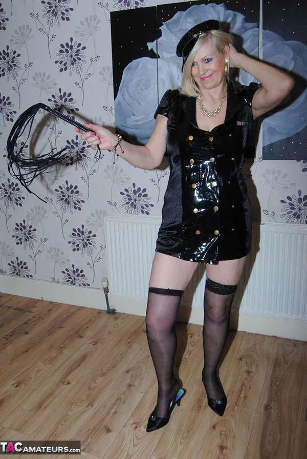 Mature blonde woman Dimonty frees her tits and twat from a short latex dress  - Mature, Saggy Tits, Latex, Stockings, Blonde, Amateur, Clothed, European, Lingerie, Panties  - Photo 15