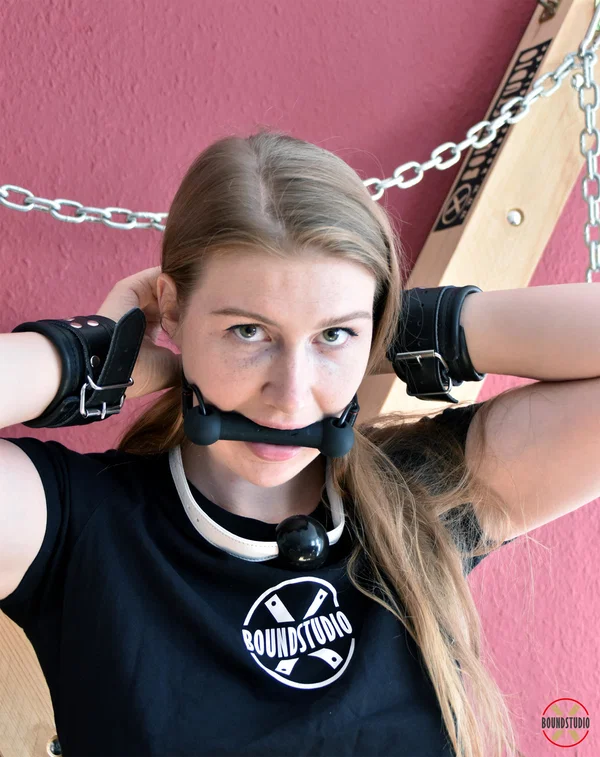 Experimental Yuly dons gags before being attached to a St Andrew's Cross  - BDSM, Bondage, Clothed, Non Nude  - Photo 4