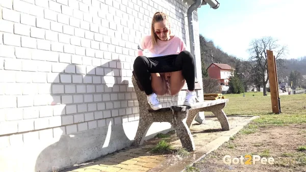 Solo girl Naomi Bennet pisses on a public bench in the middle of the day  - Pissing, Public, Czech, Pussy, Glasses, Outdoor, Blonde, Spreading, Close Up, Babe  - Photo 10