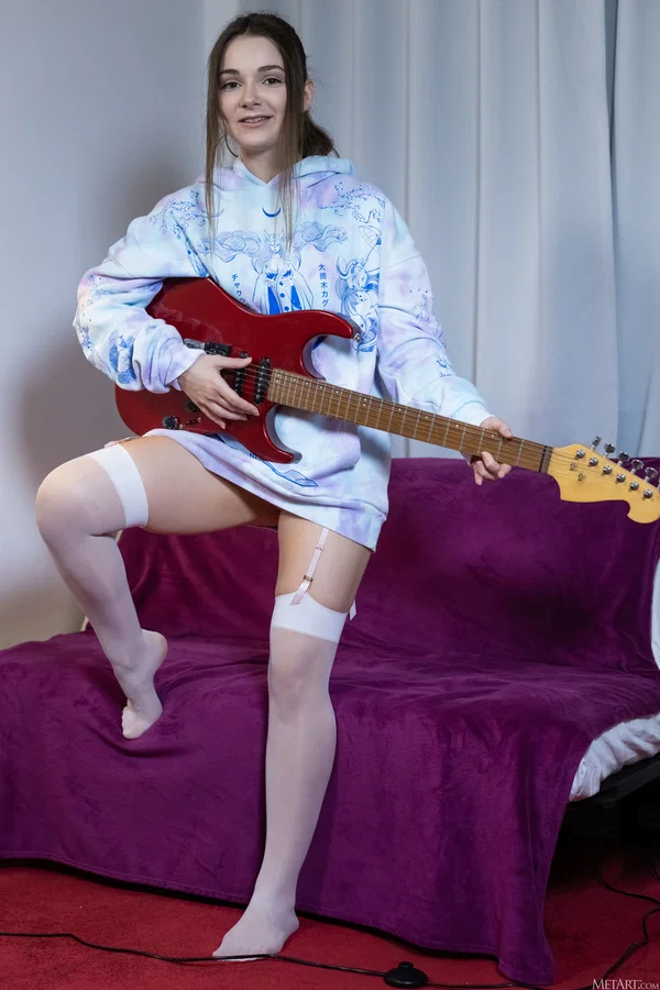 Cute teen undresses to play the electric guitar in white stockings  - Stockings, Teen, Cute, Feet, Glamour, Babe, Beautiful, Solo, Non Nude, Spreading  - Photo 1