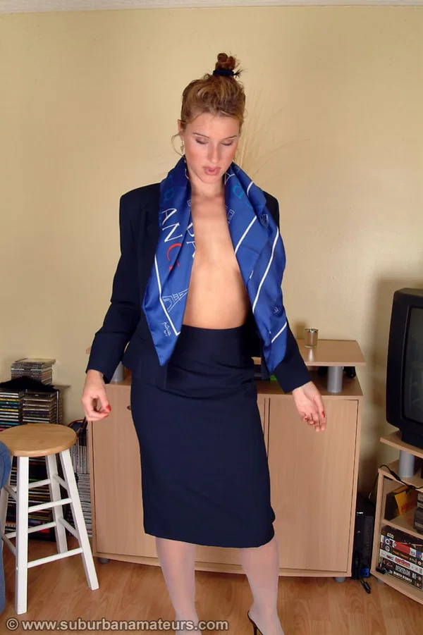 Sexy stewardess Angelina loses her uniform and spreads her hairy vagina  - Mature, British, Hairy, Tall, Spreading, Pussy, European, Uniform, Feet  - Photo 3