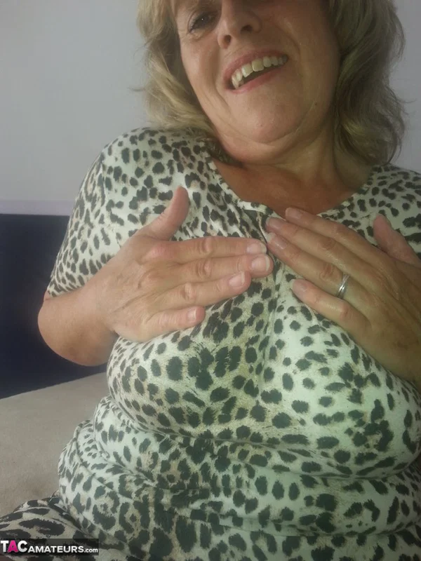 Mature wife Caro frees her fatty big tits & sucks her vibrator before toying  - Mature, BBW, Amateur, Clothed, Big Tits, Skirt, European, Blonde, Chubby, Curvy  - Photo 4