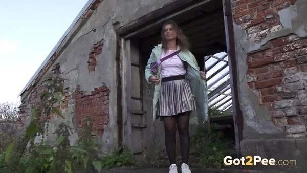 White girl Rita takes a piss by an abandoned building while taking a shortcut  - Pissing, Public, Upskirt, Hairy, Stockings, Outdoor, Spreading, Pussy, Close Up, Skirt  - Photo 15