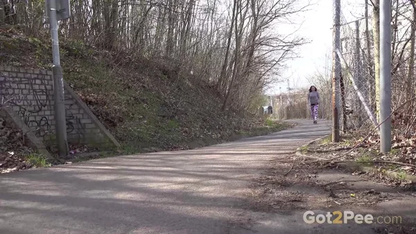 Solo girl Victoria Daniels pulls down her pants for a piss alongside a road  - Pissing, Public, Outdoor, Pussy, Czech, Brunette, Close Up, Solo, European, Babe  - Photo 1
