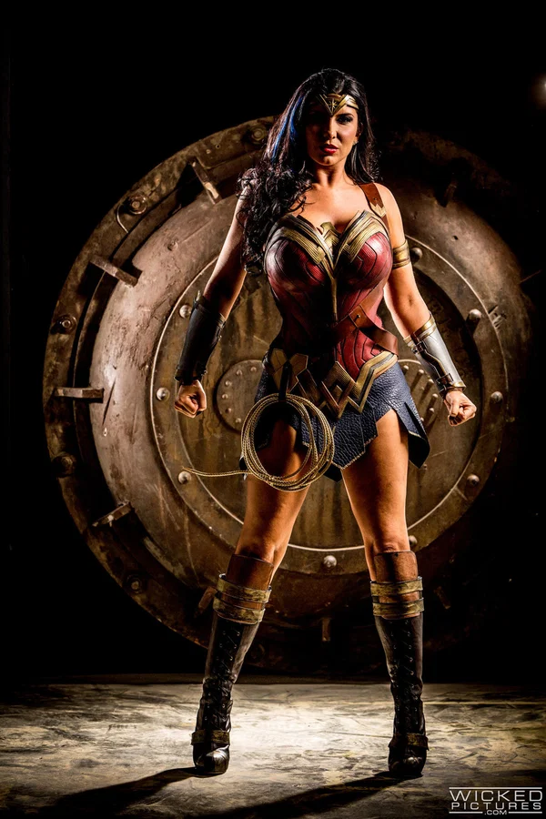 Kinky MILF in a Wonder Woman costume Romi Rain gets rammed by three dudes  - Cosplay, Bukkake, Uniform, Gangbang, Cumshot, Facial, Cum In Mouth, Blowbang, Big Tits, Handjob  - Photo 1