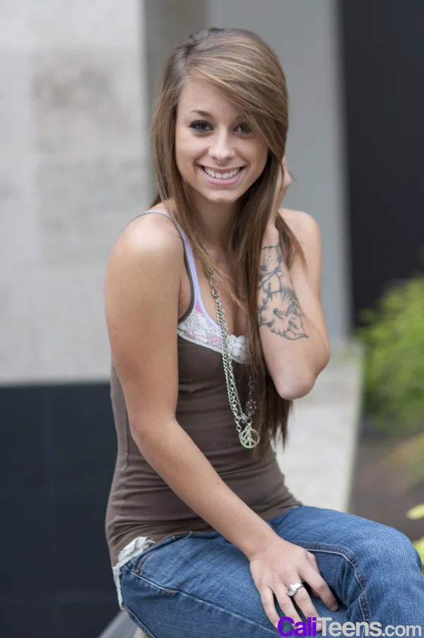Sweet teen Rilee Jensen exposes her small tits in a public square  - Teen, Outdoor, Clothed, Jeans, Babe, Nipples, Tattoo, Tiny Tits, Beautiful, Solo  - Photo 9