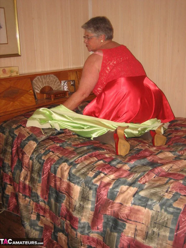 Fat granny Girdle Goddess pets her pussy after stripping to hosiery on her bed  - Granny, BBW, Stockings, Amateur, Glasses, High Heels, Clothed, Chubby, Short Hair, Curvy  - Photo 5