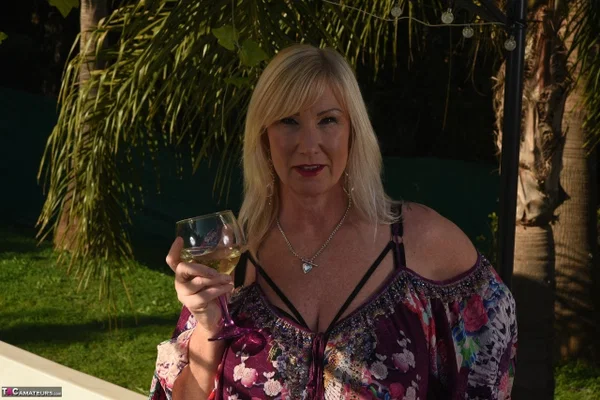 Fat older blonde Melody peels off black leggings afore an outdoor hot tub  - Mature, BBW, Curvy, Thick, Yoga Pants, Pool, Chubby, Amateur, Outdoor, Non Nude  - Photo 2