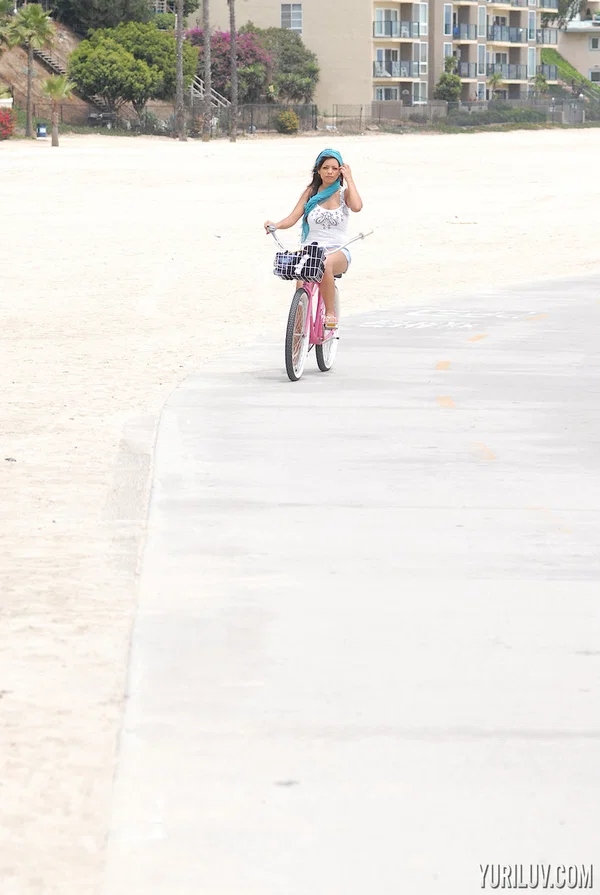 Dark-haired pornstar Yuri Luv goes for a bike ride in her lovely outfit  - Beach, Shorts, MILF, Beautiful, Babe, Pornstar, Outdoor, Reality, Sexy, Solo  - Photo 1