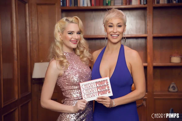 Blonde slut Kenna James poses with a female fan in a sparkly dress  - Skirt, Reality, Blonde, Pornstar, Cute, Teen, Non Nude, Legs  - Photo 1